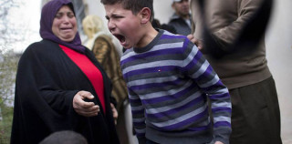 A Palestinian child’s reaction after seeing his family home being demolished by israel